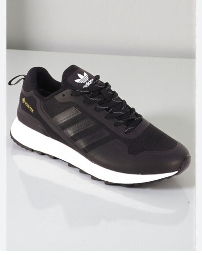 : "Adidas Gore-Tex Originals : Le 'Classique' du Flow à Dakar ! 🇸🇳👟"