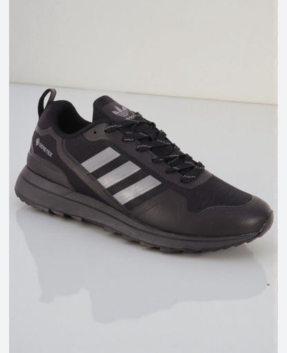 : "Adidas Gore-Tex Originals : Le 'Classique' du Flow à Dakar ! 🇸🇳👟"